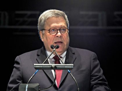 Attorney General William Barr speaks at the National Law Enforcement Officers Memorial Fund Annual Candlelight Vigil to commemorate new names added to the monument, during a ceremony at the National Mall in Washington, Monday May 13, 2019. (AP Photo/Jose Luis Magana)