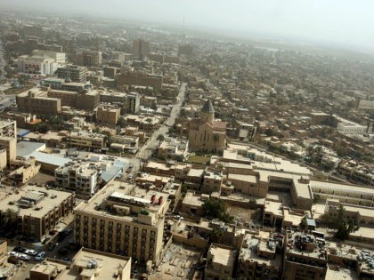 An aerial view shows Baghdad's al-Tayaran square on March 3, 2008. Five years after US-led troops swept across Iraq, Baghdad -- for centuries a beacon of culture in the Arab world, today a city under occupation divided by concrete walls -- refuses to see its spirit crushed. AFP PHOTO/PATRICK BAZ …
