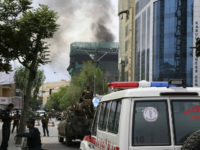 Smoke billows from a building during an ongoing attack by Taliban militants on a compound housing and international aid organisation in Kabul on May 8, 2019. - A large blast rocked central Kabul Wednesday, officials confirmed, sending a plume of black smoke over the city in the latest explosion to …