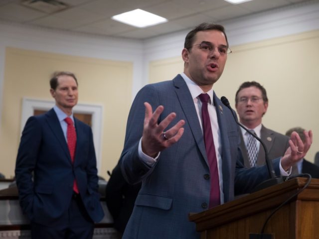 Rep. Justin Amash, R-Mich., center, is joined by, from left, Sen. Ron Wyden, D-Ore., Rep. Thomas Massie, R-Ky., and Rep. Ralph Norman, R-S.C., as he hosts a news conference with a bipartisan group of House and Senate lawmakers who are demanding the U.S. government should be required to seek warrants …