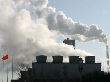 CHANGSHAN, JILIN - DECEMBER 30: Smoke billows from chimneys of factories on December 30, 2