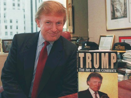 Donald Trump, the New York developer, poses in his Manhattan office beside a copy of his n