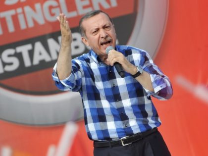 Turkish Prime Minister Recep Tayyip Erdogan makes a speach to supporters during a rally on