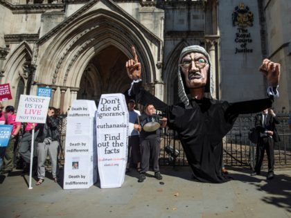 Supporters from the group Distant Voices, who oppose the liberalisation of euthanasia laws, demonstrate with a giant puppet of a judge outside the Royal Courts of Justice, Strand on July 17, 2017 in London, England. Noel Conway, 67, who is terminally ill with motor neurone disease, is seeking a legal …