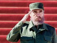 HAVANA, CUBA: Cuban President Fidel Castro (R) and Cambodia's Prime Minister Samdech Hun Sen (L) salute a passing honor guard during a welcome ceremony at the State Council in Havana 09 September 1999. Hun Sen is on a four-day official visit to Cuba following Castro's invitation. (ELECTRONIC IMAGE) AFP PHOTO/ADALBERTO …