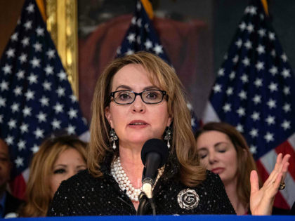 Former US Representative Gabrielle Giffords, who was shot in the head in 2011, speaks at a press conference to introduce legislation on expanding background checks for gun sales at the Capitol in Washington, DC, on January 8, 2019. (Photo by NICHOLAS KAMM / AFP) (Photo credit should read NICHOLAS KAMM/AFP/Getty …