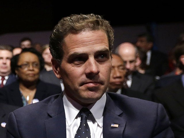 FILE - In this Oct. 11, 2012, file photo Hunter Biden waits for the start of the his fathe