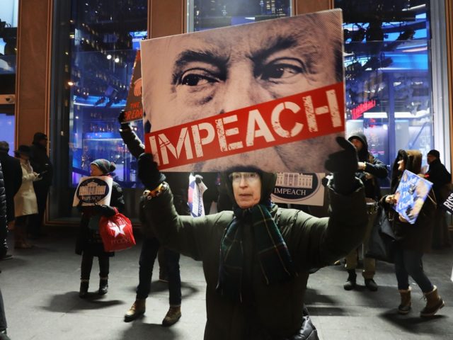 NEW YORK, NY - DECEMBER 14: People protest outside of the Fox News Channel headquarters to demand the resignation of President Donald Trump after accusations of sexual assault have re-surfaced against him on December 14, 2017 in New York City. Numerous high profile Fox executives have resigned after charges of …