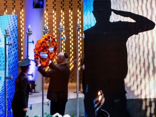 Israeli Prime Minister Benjamin Netanyahu places a wreath of flowers during the Memorial D