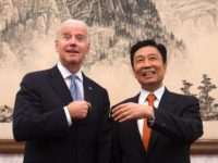 BEIJING, CHINA - DECEMBER 05: U.S. Vice President Joe Biden (L), and his Chinese counterpart Li Yuanchao share a light moment before heading to their luncheon at the Diaoyutai State Guesthouse on December 5, 2013 in Beijing, China. U.S Vice President Joe Biden is on an official visit to China …