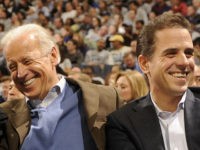 WASHINGTON - JANUARY 30: President of the United States Barack Obama and Vice President Joe Biden and Hunter Biden (son of Joe Biden) talk during a college basketball game between Georgetown Hoyas and the Duke Blue Devils on January 30, 2010 at the Verizon Center in Washington DC. (Photo by …