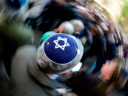 A participant of the "Berlin wears kippa" rally wears a kippa in Berlin on April 25, 2018.