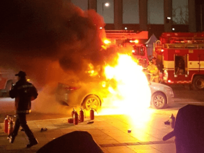 This picture taken on January 9, 2019 by eyewitness Lee Sang-ho shows a burning taxi vehic