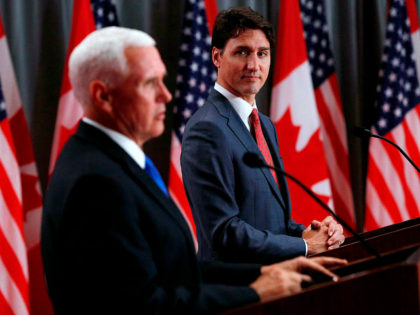 US Vice President Mike Pence (L) and Canadian Prime Minister Justin Trudeau deliver a joint press conference in Ottawa, Ontario, on May 30, 2019. (Photo by Lars Hagberg / AFP) (Photo credit should read LARS HAGBERG/AFP/Getty Images)