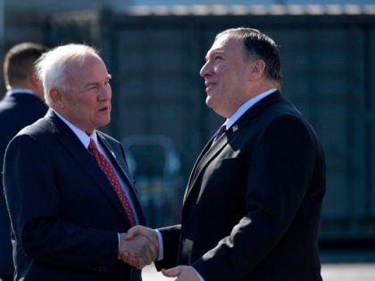 US Secretary of State Mike Pompeo (R) shakes hands with the US' ambassador to Finland Robert Frank Pence (2nd R) after arriving in Rovaniemi, Finland, on May 6, 2019. - Pompeo is in Rovaniemi to attend the Arctic Council Ministerial Meeting. (Photo by MANDEL NGAN / POOL / AFP) (Photo …
