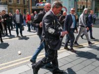 Brexit Party leader Nigel Farage has what is thought to have been a milkshake thrown over him as he visits Northumberland Street in Newcastle Upon Tyne during a whistle stop UK tour on May 20, 2019 in Newcastle Upon Tyne, England. His visit to Newcastle comes ahead of the 2019 …