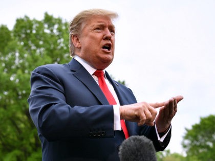 US President Donald Trump speaks to reporters before boarding Marine One from the South Lawn of the White House in Washington, DC on April 26, 2019. - Trump is heading to Indianapolis to address the National Rifle Association annual meeting. (Photo by MANDEL NGAN / AFP) (Photo credit should read …