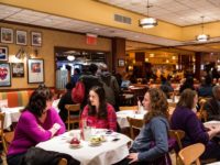 NEW YORK, NY - FEBRUARY 21: Women wait for their food at Junior's restaurant, a staple of Brooklyn dining since the 1950s, on February 21, 2014 in the Downtown Brooklyn neighborhood of the Brooklyn borough of New York City. The restaurant recently announced it would be closing - many assume …