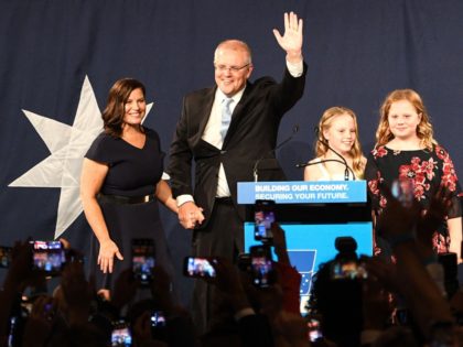 Australia's newly elected Prime Minister Scott Morrison (C) arrives to deliver a victory s