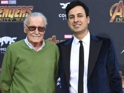 FILE - In this April 23, 2018, file photo, Stan Lee, left, and Keya Morgan arrive at the world premiere of "Avengers: Infinity War" in Los Angeles. Morgan, the former business manager of Lee has been arrested on elder abuse charges involving the late comic book icon. Los Angeles police …