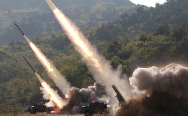 This May 9, 2019 picture released from North Korea's official Korean Central News Agency (KCNA) shows rocket launchers firing during a drill by units of the Korean People's Army 70 countries urge North Korea to scrap nuclear, ballistic weapons