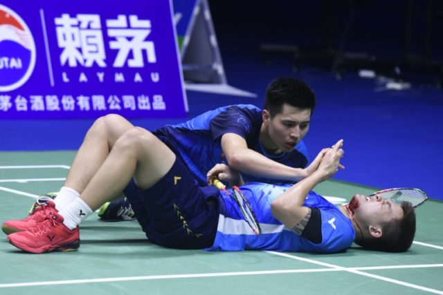 Bloodied Malaysia exit Sudirman Cup after freak injury ...