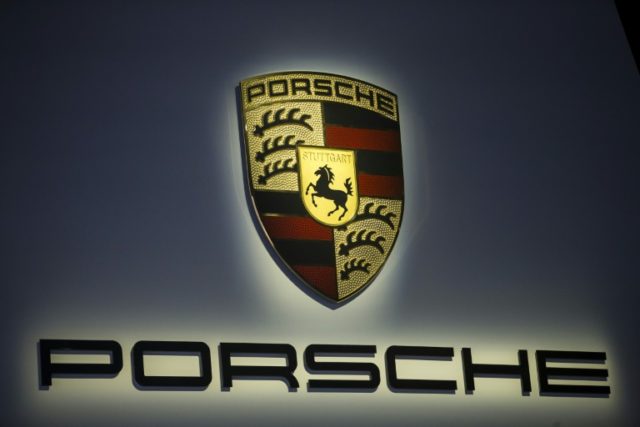 German prosecutors were looking for evidence that Porsche may have improperly received information from an official auditor German prosecutors raid Porsche in corruption probe