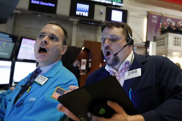 Financial Markets Wall Street John Alatzas, Michael Milano Specialist John Alatzas, left, and trader Michael Milano work on the floor of the New York Stock Exchange, Wednesday, May 1, 2019. Stocks are opening higher on Wall Street after several big U.S. companies reported earnings that were better than analysts were expecting. (AP Photo/Richard Drew) The Associated Press