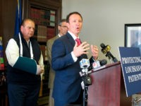 Attorney General Jeff Landry talks about health care legislation supported by House Speaker Taylor Barras, R-New Iberia, left, and sponsored by Sen. Fred Mills, R-Parks, on Monday, April 1, 2019, in Baton Rouge, La. (AP Photo/Melinda Deslatte)