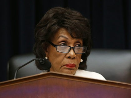 FILE - In this April 10, 2019, file photo, House Financial Services Committee chairwoman Maxine Waters, D-Calif., listens during a hearing with leaders of major banks on Capitol Hill in Washington. After nearly three decades in Waters has become the highest-ranking African American woman in the country. (AP Photo/Patrick Semansky, …
