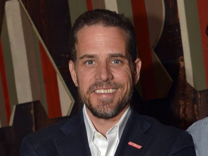IMAGE DISTRIBUTED FOR PARTICIPANT MEDIA - Hunter Biden, left, and Hugh Evans pose for a ph