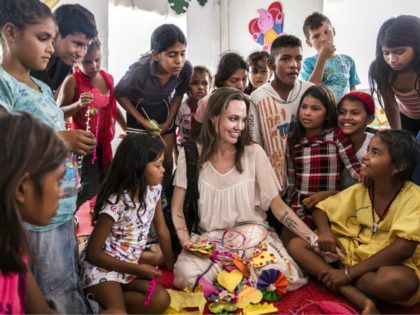 MAICO, COLOMBIA - JUNE 08: (EDITORIAL USE ONLY) In this handout image provided by United Nations High Commission for Refugees, UNHCR Special Envoy Angelina Jolie meets with children who fled Venezuela, at the Integrated Assistance Centre on June 8, 2019 in Maicao, Colombia. The Integrated Assistance Centre provides integrated assistance …