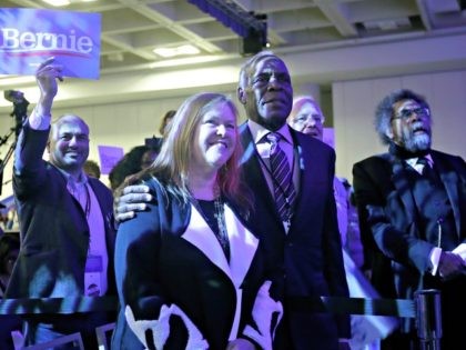 Jane O'Meara Sanders, the wife of Democratic presidential candidate Sen. Bernie Sanders, I-Vt., center left, stands with actor Danny Glover during the 2019 California Democratic Party State Organizing Convention in San Francisco, Sunday, June 2, 2019. (AP Photo/Jeff Chiu)