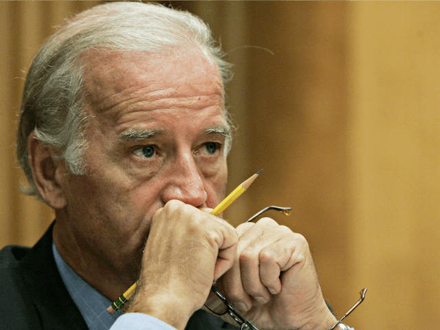 Sen. Joe Biden, D-Del., listens as Nicholas Burns, Undersecretary of State for Political A