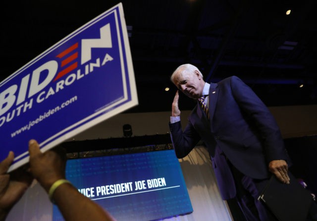COLUMBIA, SOUTH CAROLINA - JUNE 22: Democratic presidential candidate former Vice President Joe Biden salutes a veteran in the crowd at the South Carolina Democratic Party State Convention on June 22, 2019 in Columbia, South Carolina. Twenty-two Democratic presidential candidates are scheduled to appear in South Carolina this weekend as …