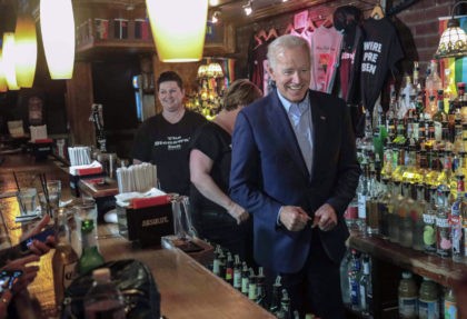 Former Vice President and 2020 Democratic presidential candidate Joe Biden, right, joins b