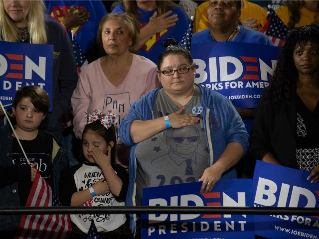 Supporters pledge allegiance to the flag before listening to Former U.S. Vice President Joe Biden speak at a campaign rally at Teamsters Local 249 Union Hall April 29, 2019 in Pittsburgh, Pennsylvania. Biden began his first full week of campaigning for president by speaking on how to rebuild America's middle …