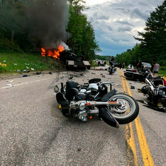 This photo provided by Miranda Thompson shows the scene where several motorcycles and a pickup collided on a rural, two-lane highway on June 21, 2019, in Randolph, N.H. (Photo: Miranda Thompson, AP)