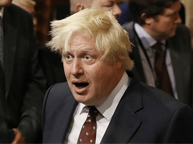 LONDON, UNITED KINGDOM - JUNE 21: British Foreign Secretary Boris Johnson walks through th