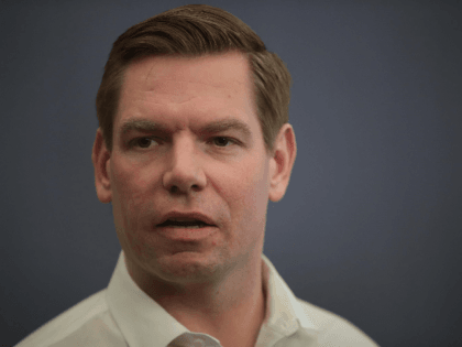 Congressman Eric Swalwell (D-CA) speaks to guests during an event at the Iowa City Public Library on February 18, 2019 in Iowa City, Iowa. Swalwell has been making stops around Iowa talking to voters as he mulls a decision to seek the 2020 Democratic nomination for president. (Photo by Scott …
