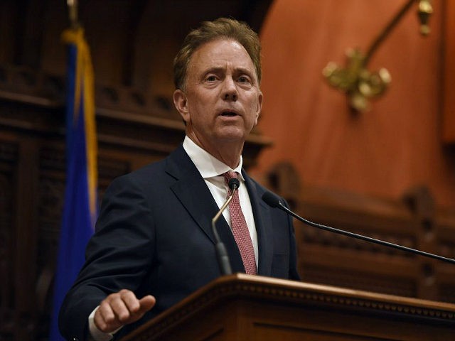 Connecticut Gov. Ned Lamont addresses the House and the Senate at the State Capitol in Hartford, Conn., Thursday, June 6, 2019. (AP Photo/Jessica Hill)