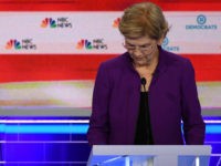 Democratic presidential hopefuls US Senator from New Jersey Cory Booker (L) and US Senator from Massachusetts Elizabeth Warren participate in the first Democratic primary debate of the 2020 presidential campaign season hosted by NBC News at the Adrienne Arsht Center for the Performing Arts in Miami, Florida, June 26, 2019. …