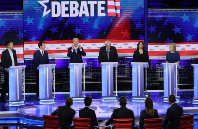 MIAMI, FLORIDA - JUNE 27: Democratic presidential candidates (L-R) former tech executive A