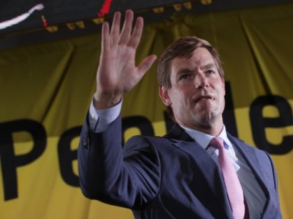 WASHINGTON, DC - JUNE 17: Democratic U.S. presidential candidate Rep. Eric Swalwell (D-CA) waves as he leaves the Moral Action Congress of the Poor People's Campaign June 17, 2019 at Trinity Washington University in Washington, DC. The Campaign held the event to focus on issues like “voting rights, health care, …