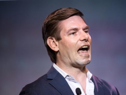 Democratic presidential candidate Rep. Eric Swalwell (D-CA) speaks to the crowd during the 2019 South Carolina Democratic Party State Convention on June 22, 2019 in Columbia, South Carolina. Democratic presidential hopefuls are converging on South Carolina this weekend for a host of events where the candidates can directly address an …