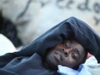 VENTIMIGLIA, ITALY - JUNE 17: Migrants gather at the French border hoping to enter the country on June 17, 2015 in Ventimiglia, Italy. A group of around 200 migrants, mostly from Libya, Sudan and Eritrea, were left stranded at the border after French police refused them entry to the country. …