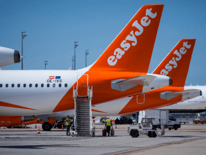 A picture taken on August 6, 2018 shows Easy Jet planes on the tarmac Roissy Charles de Ga