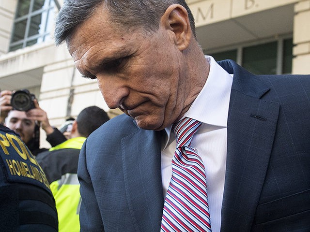 Former National Security Advisor General Michael Flynn leaves after the delay in his sente