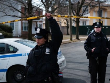 NEW YORK, NEW YORK - MARCH 14: Police stand along the street where reputed mob boss Francesco “Franky Boy” Cali lived and was gunned down on March 14, 2019 in the Todt Hill neighborhood of the Staten Island borough of New York City. Cali, 53, was a top leader of …