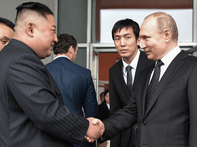 Russian President Vladimir Putin sees North Korean leader Kim Jong Un off following their